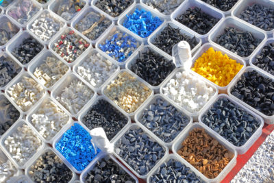 What types of plastic materials are used in plastic extrusion?